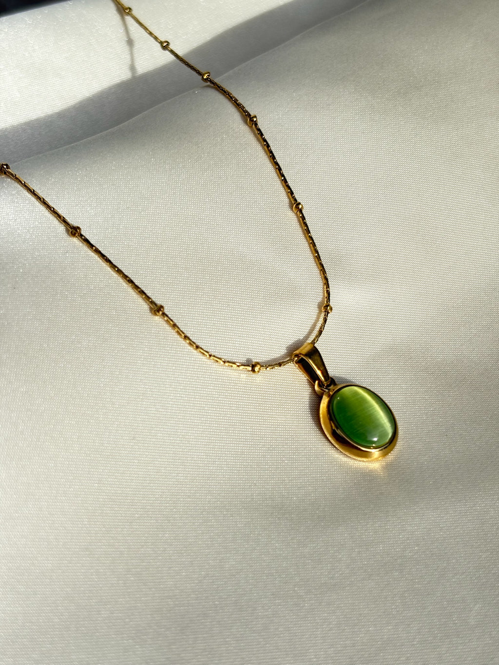 Emerald stone necklace