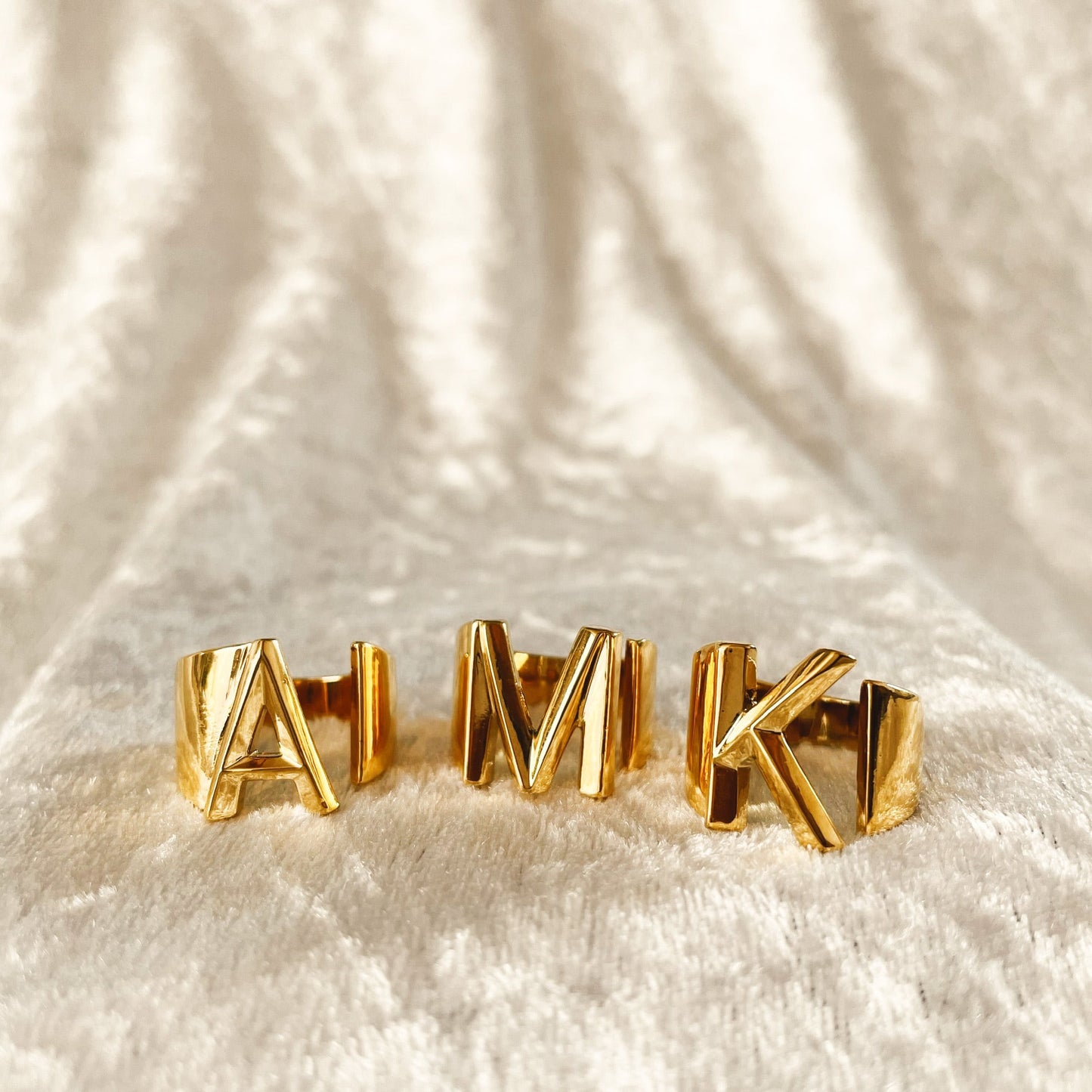 Gold letter ring